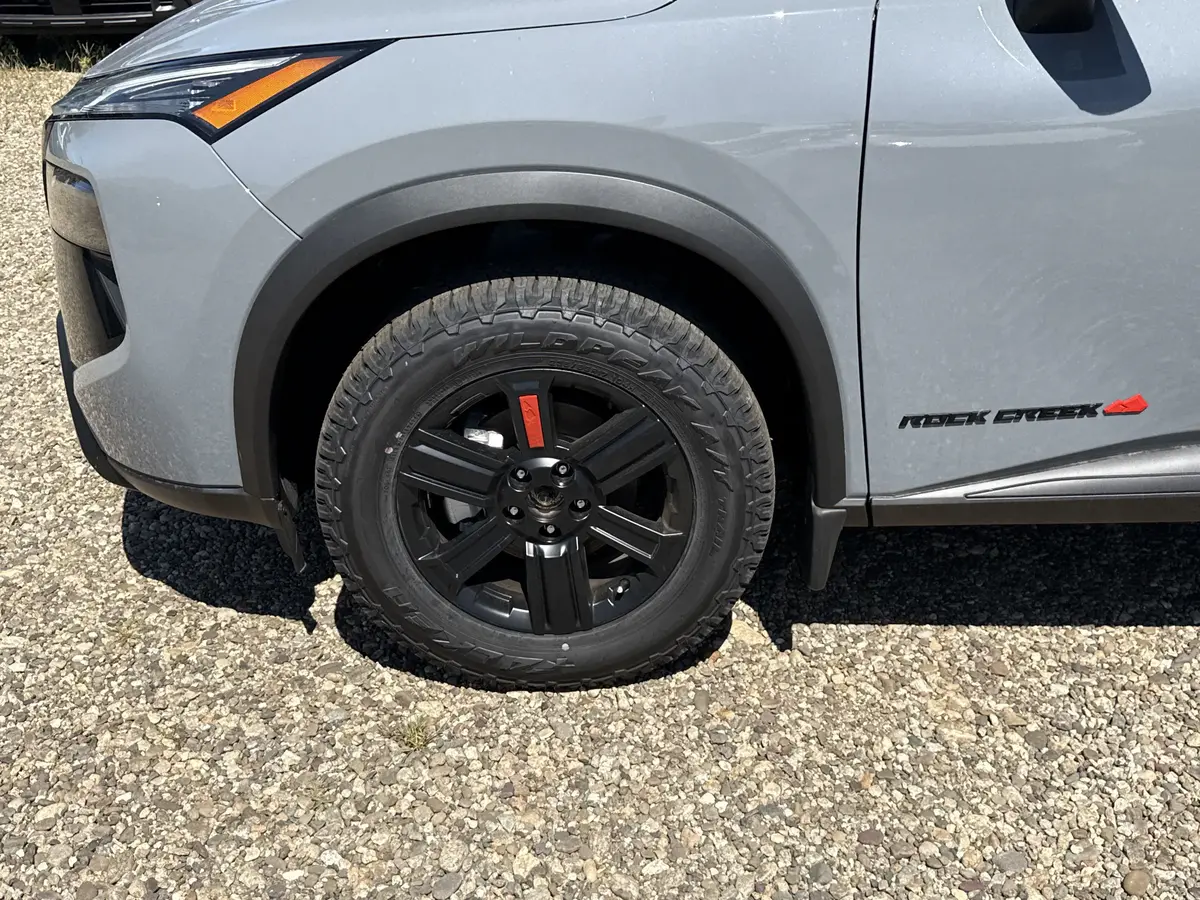 Black Wheel on Nissan Rogue Boulder Gray Pearl Color