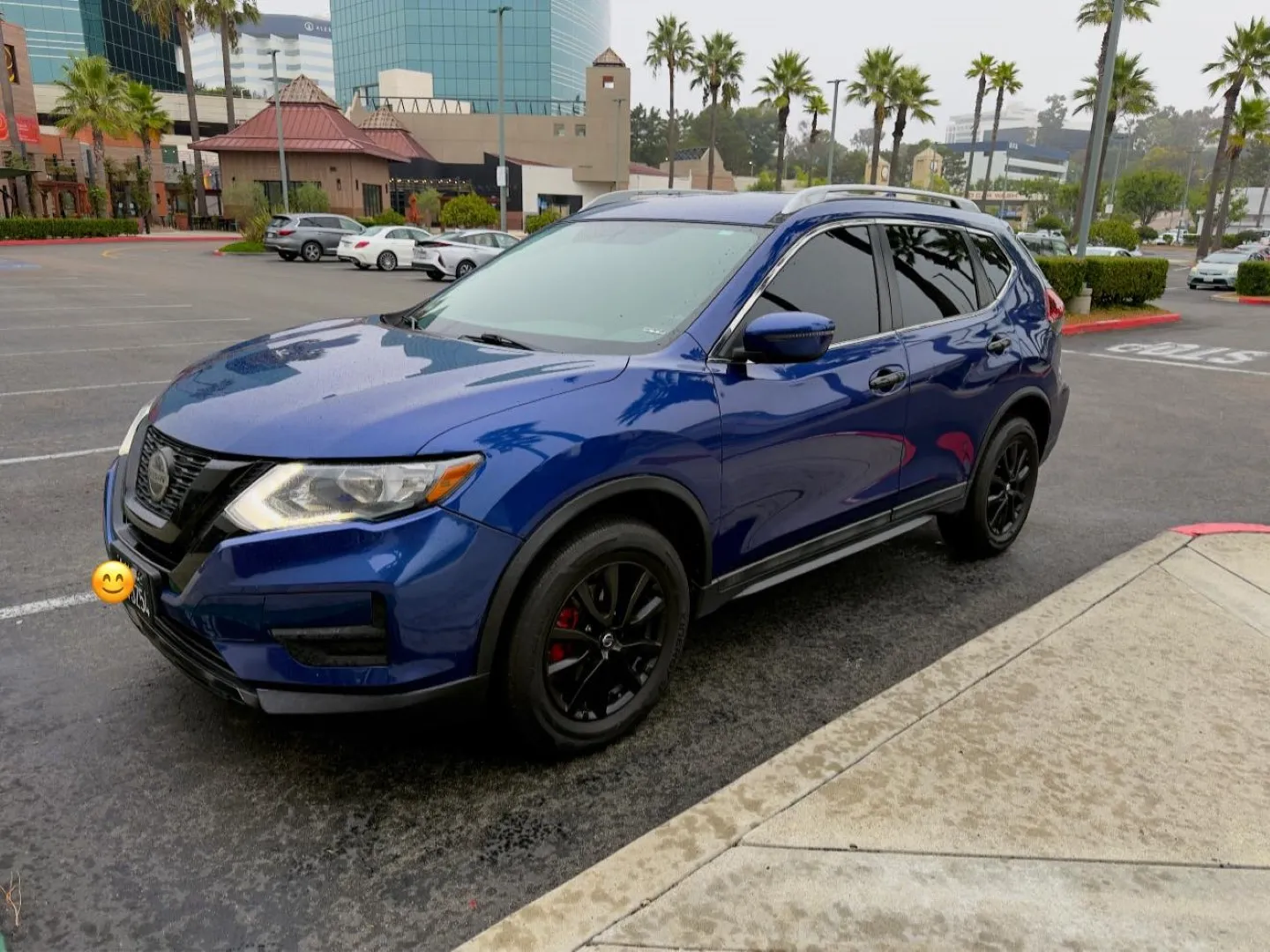 Dope Nissan Rogue Shown in Deep Ocean Blue Pearl Color
