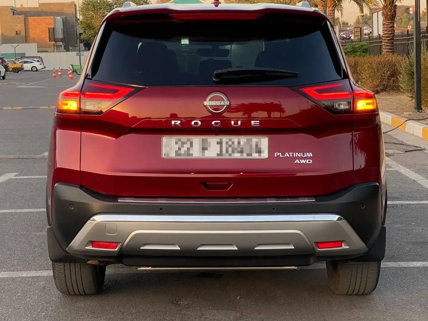 Nissan Rogue Platinum Rear end Shown in Scarlet Ember