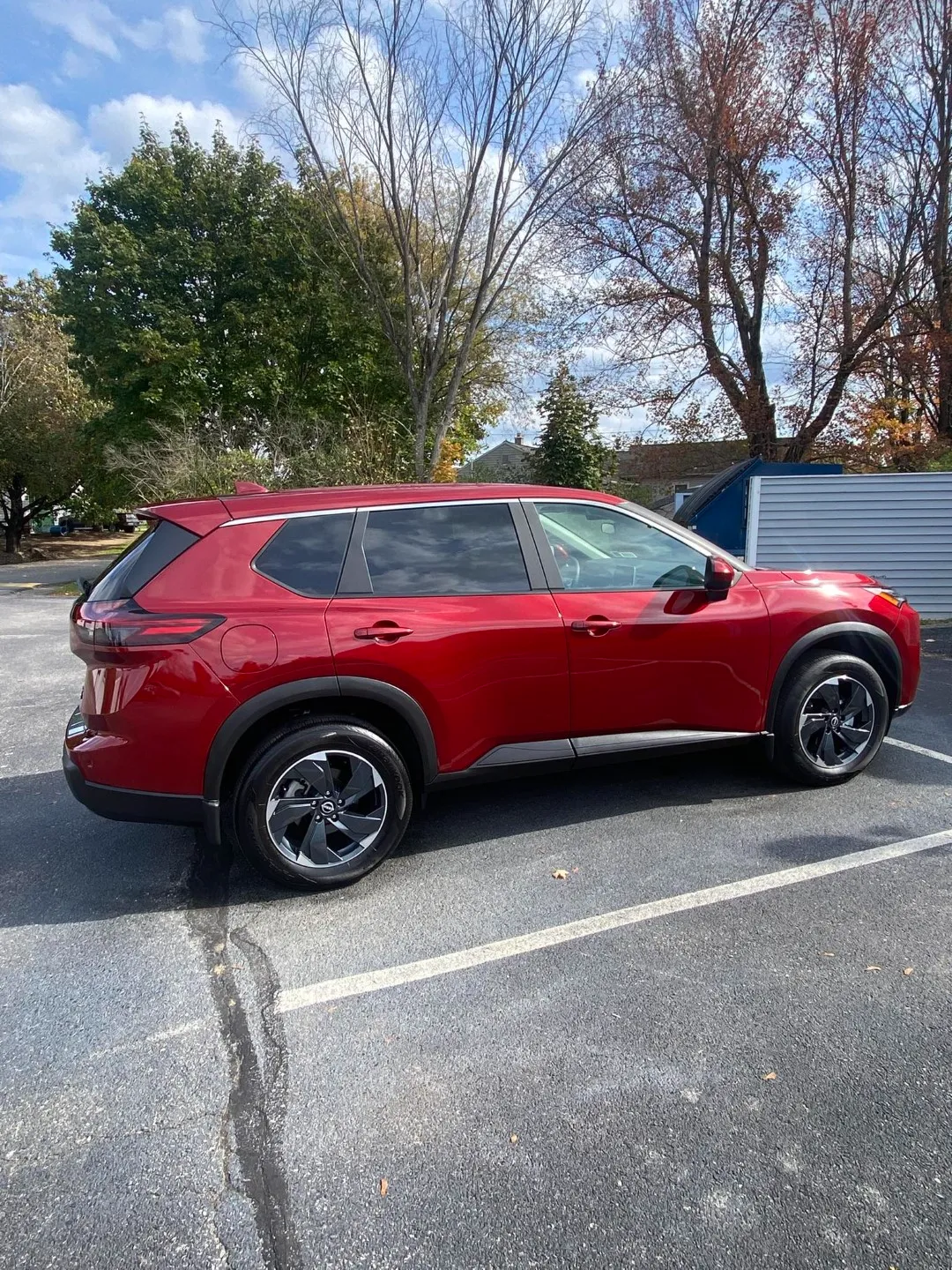 Nissan Rogue Red Scarlet Ember During Daylight
