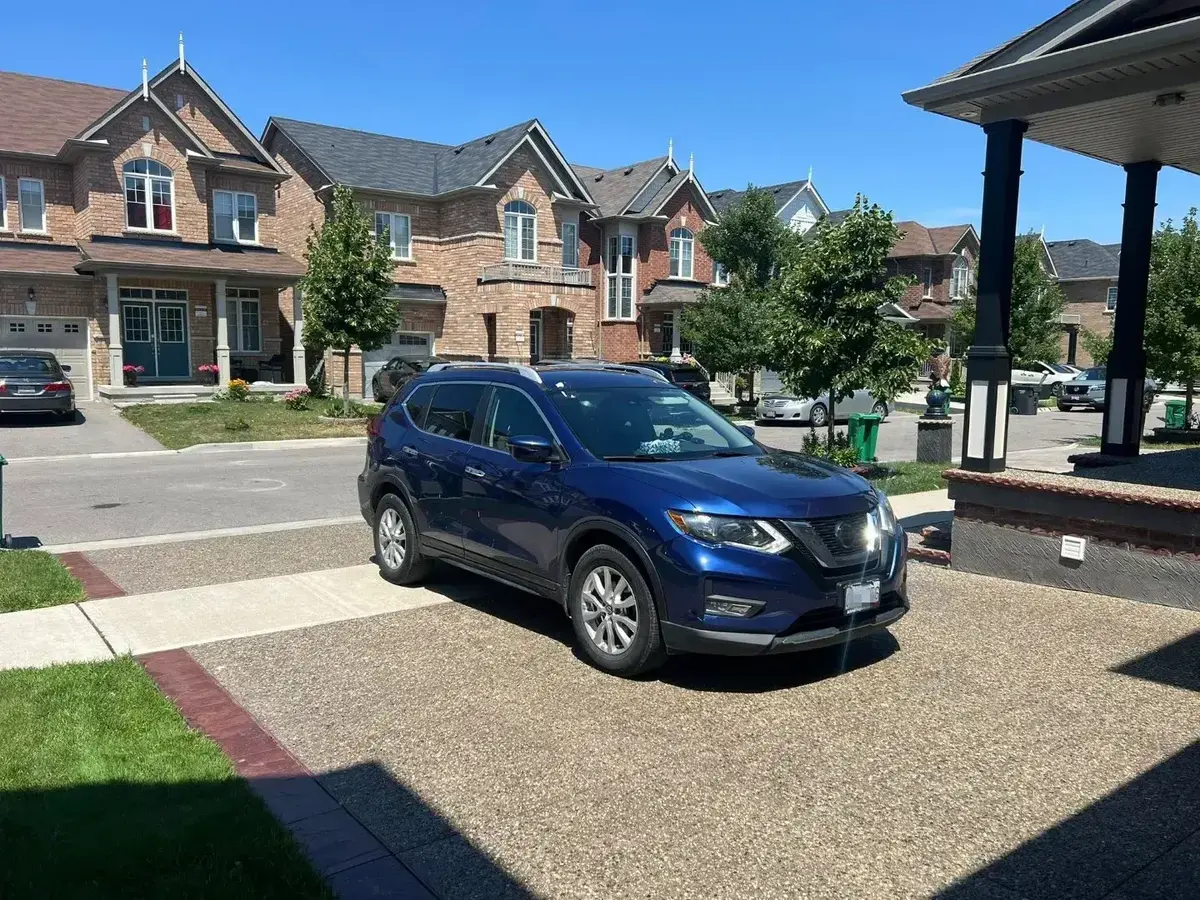 Nissan Rogue Shown in Deep Ocean Blue Pearl Color